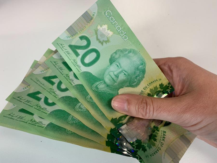 Canadian $20 bills are pictured in Toronto on Sept. 9, 2022. The Canadian Press