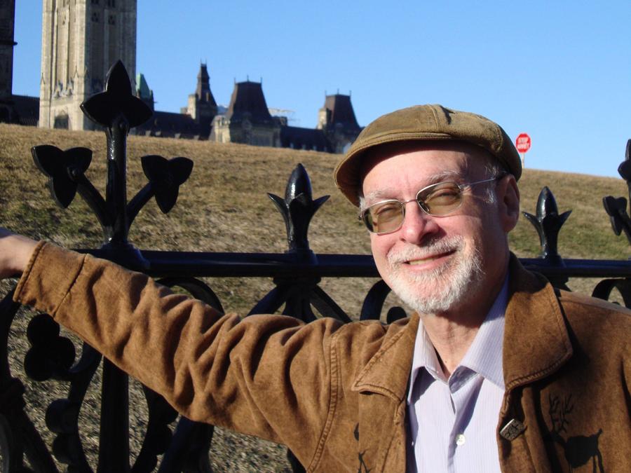 Ken Rubin stands in front of Parliament Hill in Ottawa. Photo courtesy of Debbie Rubin.
