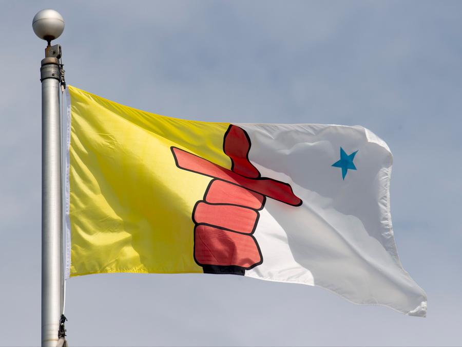 Nunavut's territorial flag flies on a flag pole in Ottawa, June 30, 2020. Adrian Wyld/The Canadian Press