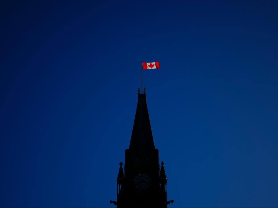 The Canada flag catches the morning light on the Peace Tower on Parliament Hill in Ottawa on April 16, 2024. Sean Kilpatrick/The Canadian Press