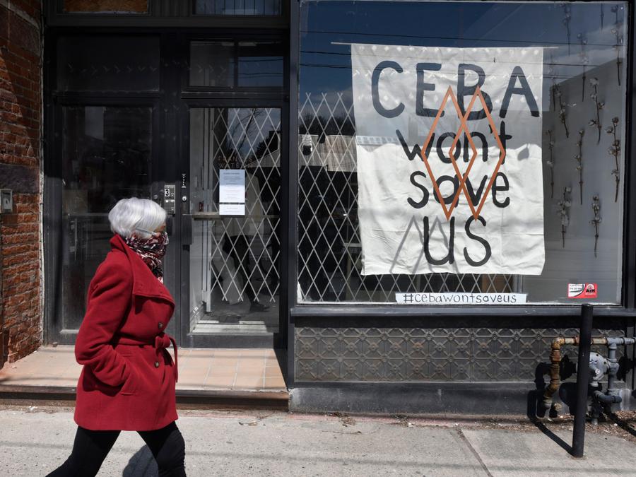 A hand painted sign about the Canada Emergency Business Account is seen in front window of a Toronto store in 2020. Fred Lum/The Globe and Mail