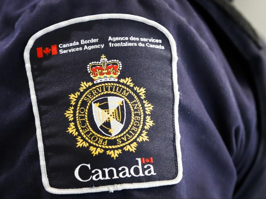 A Canada Border Services Agency patch is seen on an officer in Calgary. Jeff McIntosh/The Canadian Press